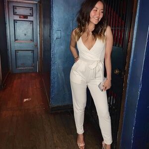White jumpsuit/romper with pockets